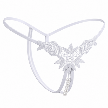 White lace thong with floral lace applique, a thin elastic waistband, and a dangling pearl bead detail