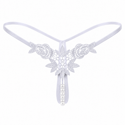 White lace thong with floral lace appliques, a pearl bead drop, and a thin elastic waistband