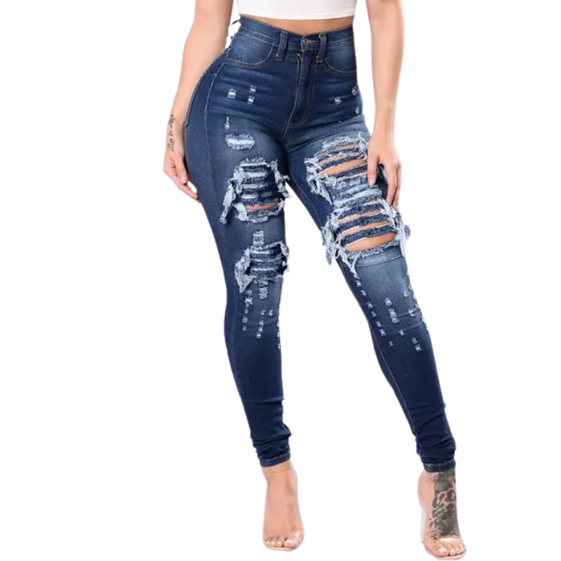 Distressed blue jeans worn by a person on a white background