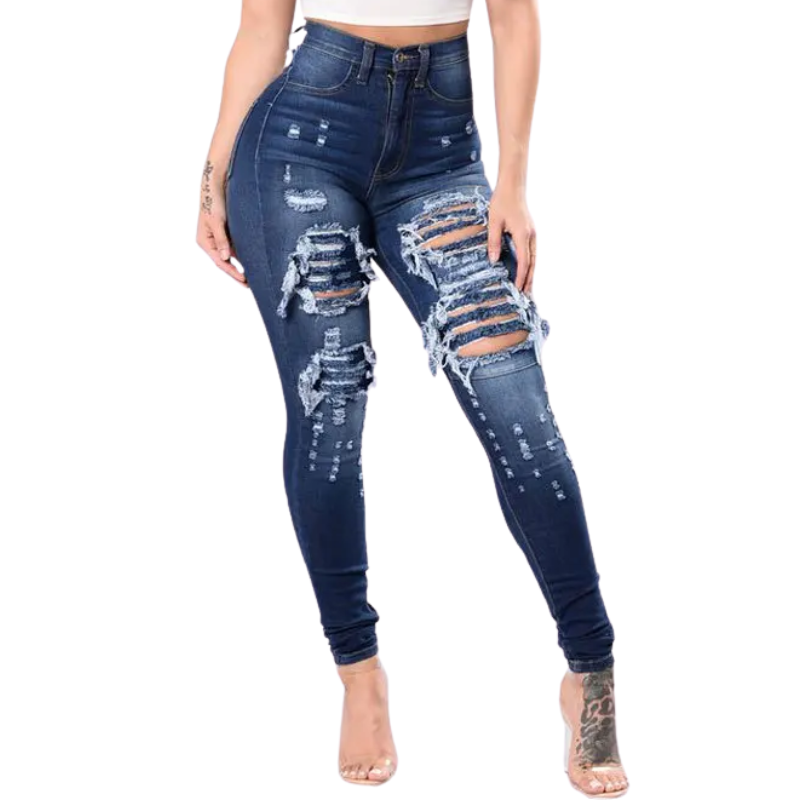 Distressed blue jeans worn by a person on a white background
