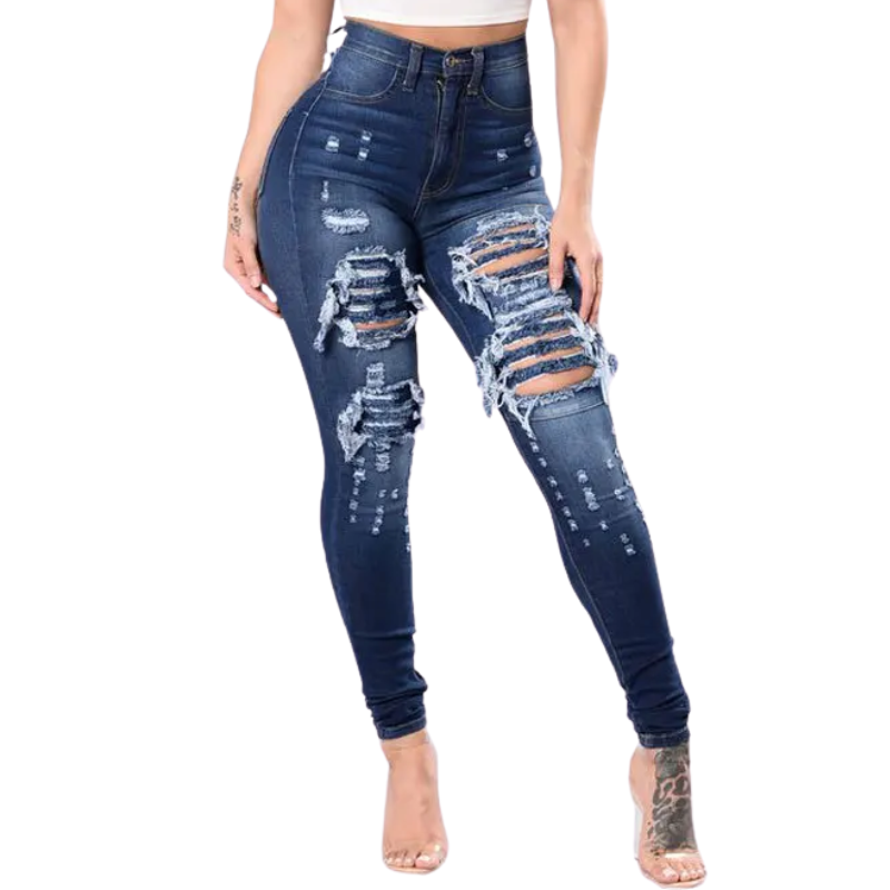 Distressed blue jeans worn by a person on a white background