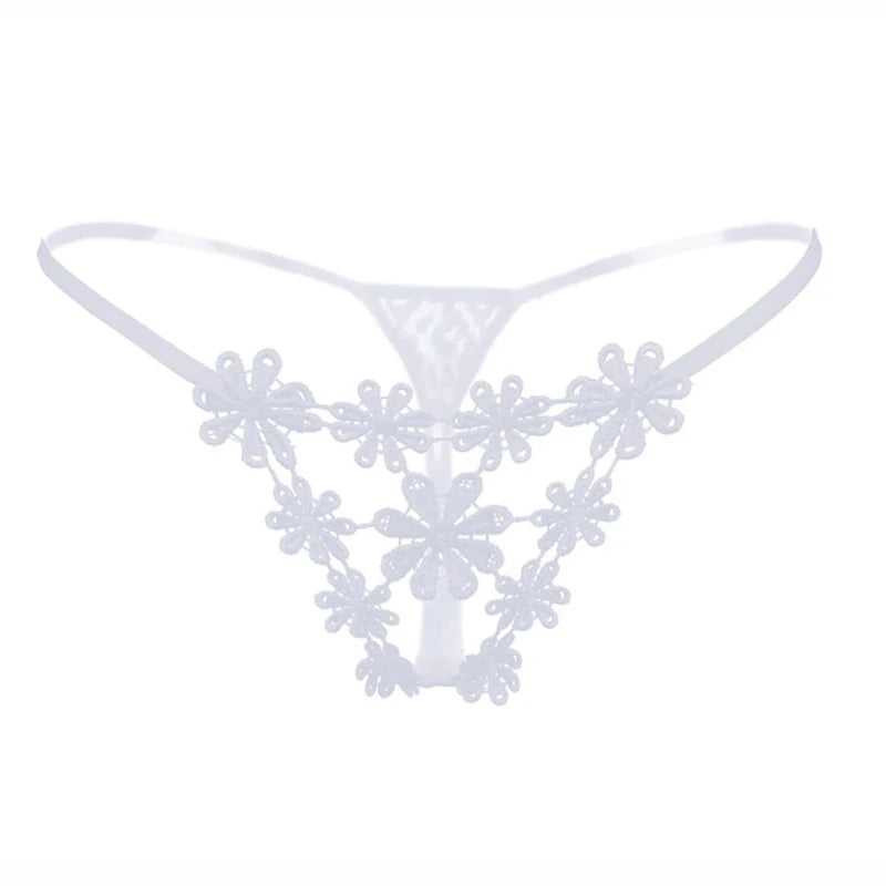 White lace thong with floral lace appliqués and a thin elastic waistband