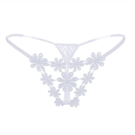 White lace thong with floral lace appliqués and a thin elastic waistband