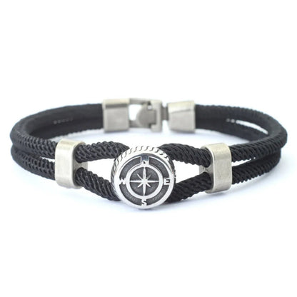 Black braided bracelet with silver compass charm