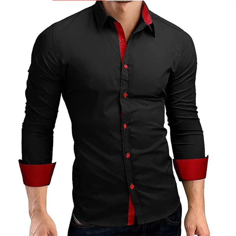 Black shirt with red accents worn by a person on a white background